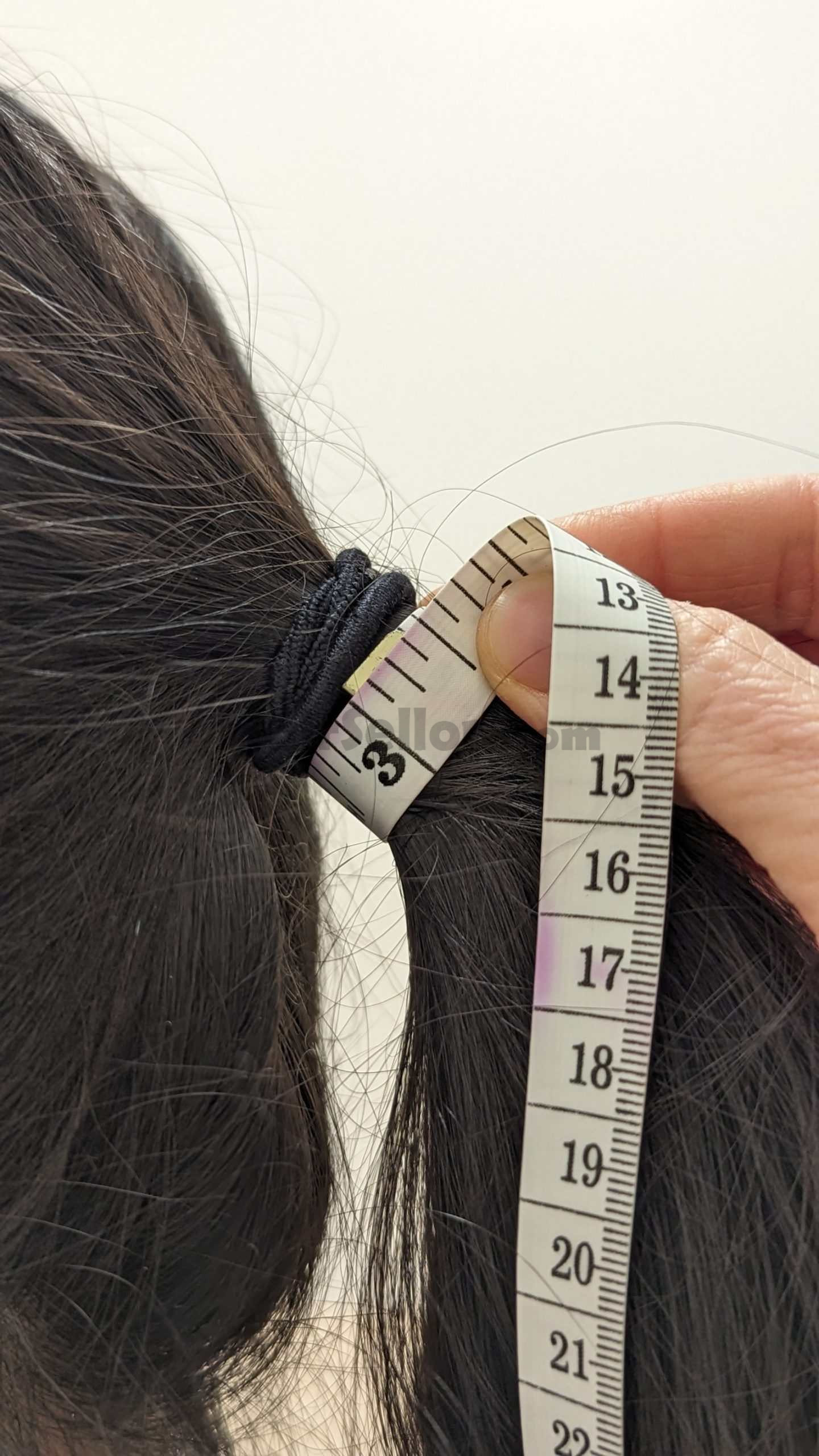 Showing how to measure hair thickness